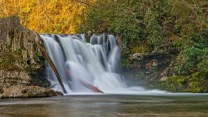 Abrams Falls with Fall Foliage in The Smoky Mountains - Pigeon Forge, Tennessee, USA